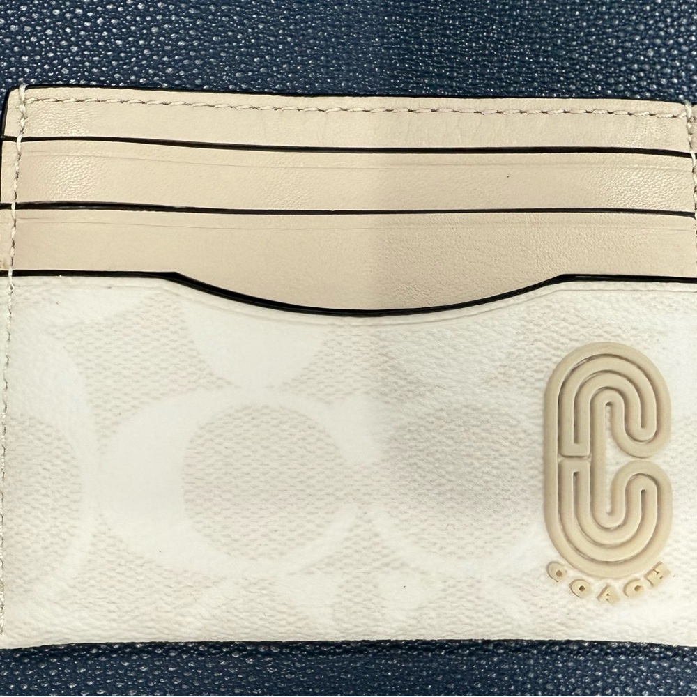 Coach card wallet. Brand new, never used.